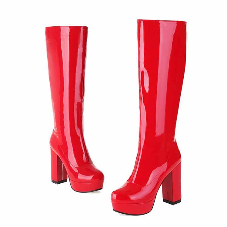 Red women's patent leather knee high boots with chunky heels for a bold look