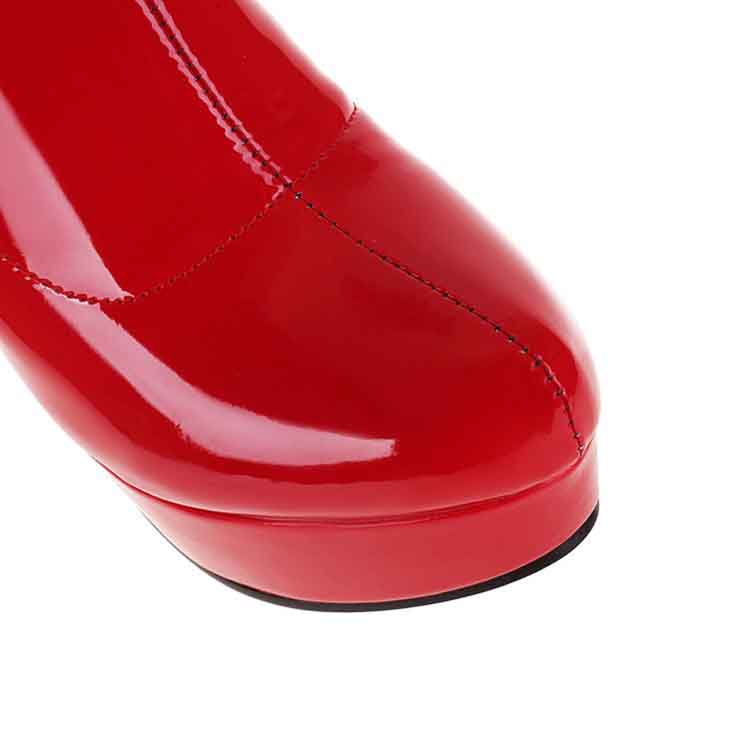 Stylish women's patent leather knee high boots in vibrant red with a sleek finish