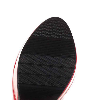 S&DCo. women's patent leather knee high boots featuring a textured sole for better traction