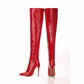 Stylish women's patent leather thigh high boots in red with a sleek pointed toe and high stiletto heel