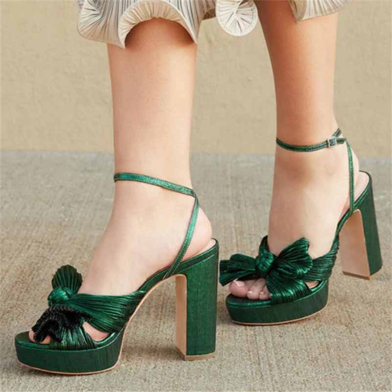 Elegant women's platform bow sandals in green with a high block heel for stylish wedding attire