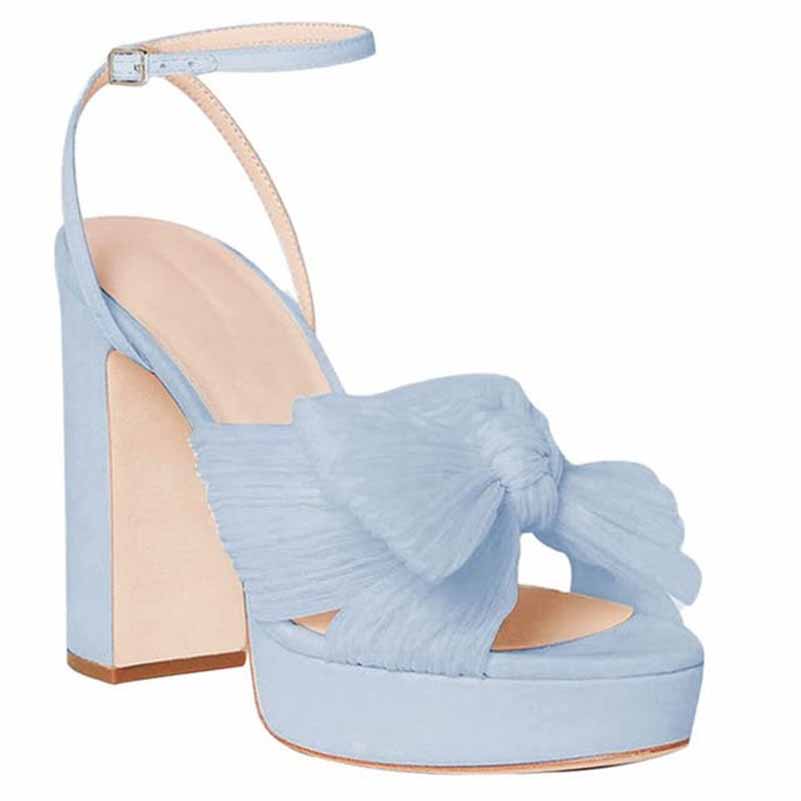 Elegant women's platform bow sandals in light blue for weddings and special occasions