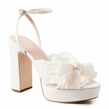 Elegant women's platform bow sandals with a stylish block heel and delicate bow detail for weddings