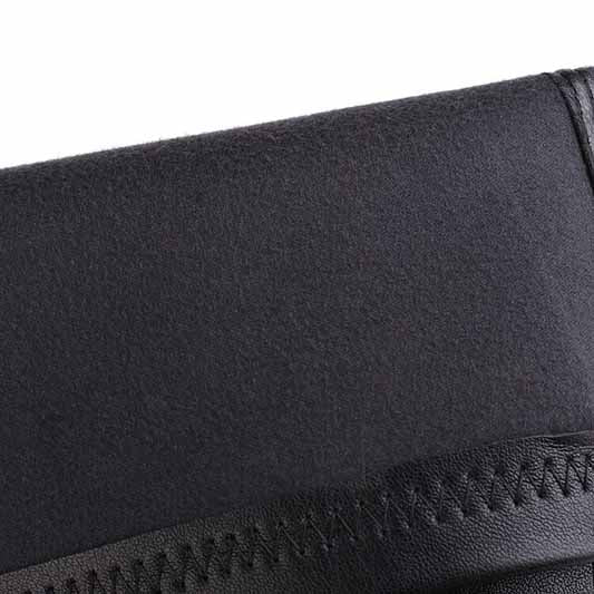 Close-up of sd-hk women's platform knee high boots showcasing soft black material and stylish stitching details.