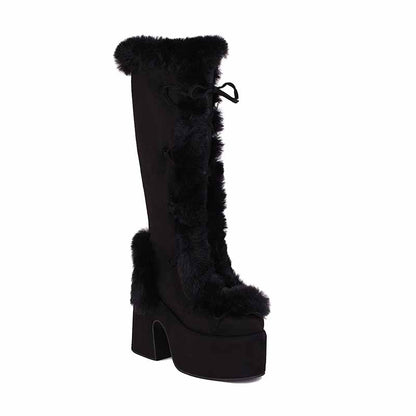 S&DCo. women's platform snow boots in black with faux fur trim for winter style and comfort