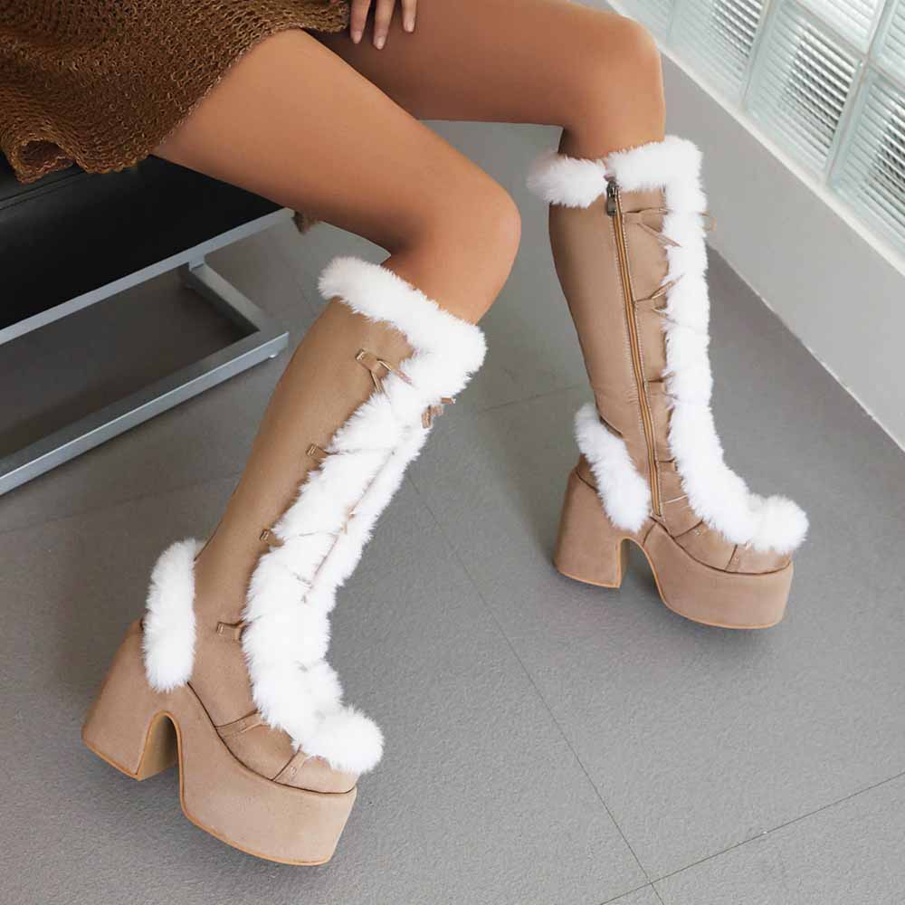Stylish women's platform snow boots with fur trim and lace-up design for winter fashion