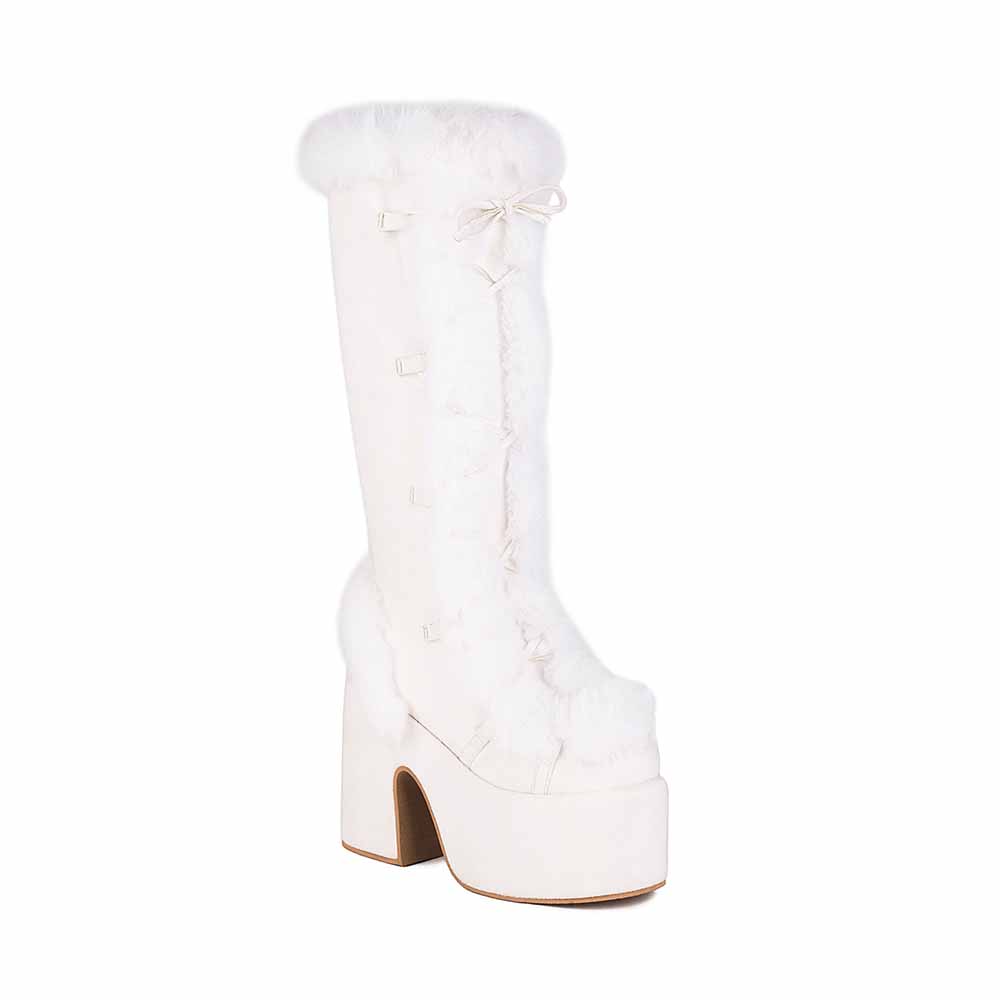 Stylish women's platform snow boots in white fur with a chunky heel for winter fashion