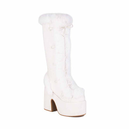 Stylish women's platform snow boots in white fur with a chunky heel for winter fashion