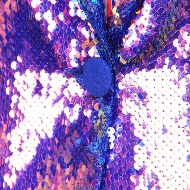 Close-up of women's sequin blazer coat featuring vibrant purple and blue sequins for a stylish look
