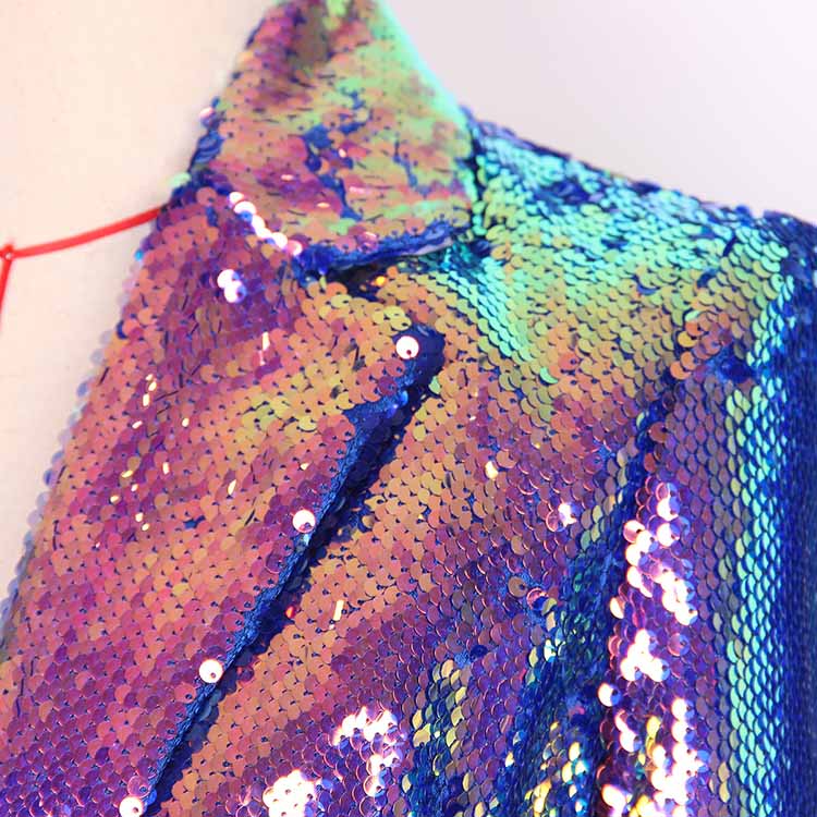 Close-up of a women's sequin blazer coat with vibrant multicolored sequins for a stylish look