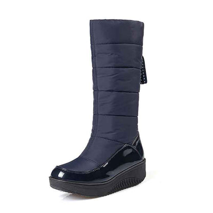 Navy women's waterproof snow boots with a sleek design and comfort padding for cold weather protection