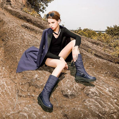 Stylish women's waterproof snow boots designed for warmth and traction in winter conditions