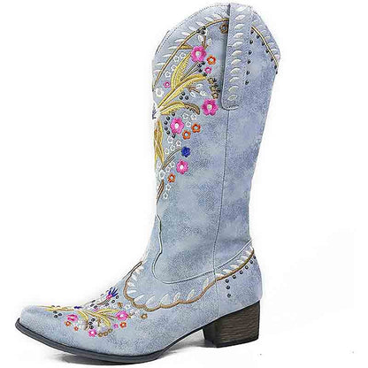 Stylish women's western cowboy boots in light blue with colorful floral embroidery details