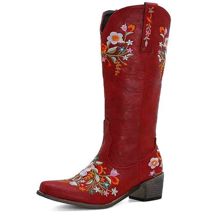 Red women's western cowboy boots featuring vibrant floral embroidery and a stylish ankle design