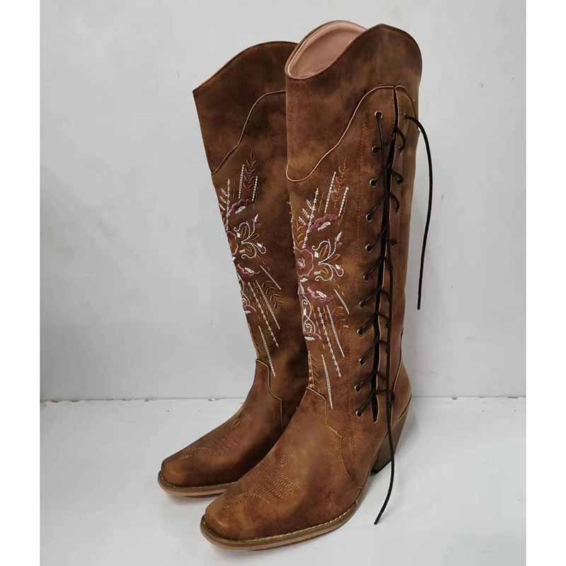 Brown women's western knee high boots with decorative stitching and lace-up design