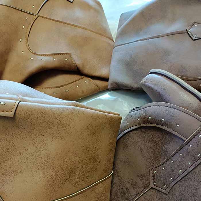 Women's western short wedding boots in various shades with decorative stitching and unique design