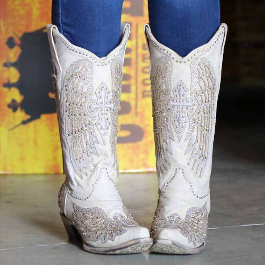 Stylish women's white glitter wedding boots with intricate wing designs for a unique bridal look