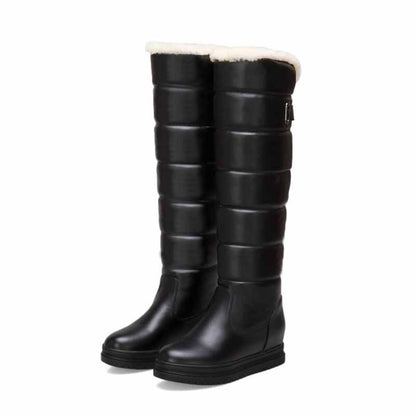 Women's winter knee high boots in black with plush lining for warmth and comfort